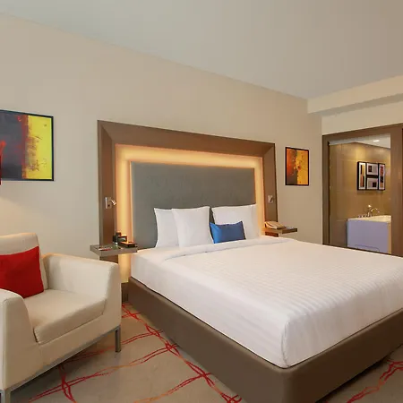 Novotel Ahmedabad Exterior photo A room at the hotel